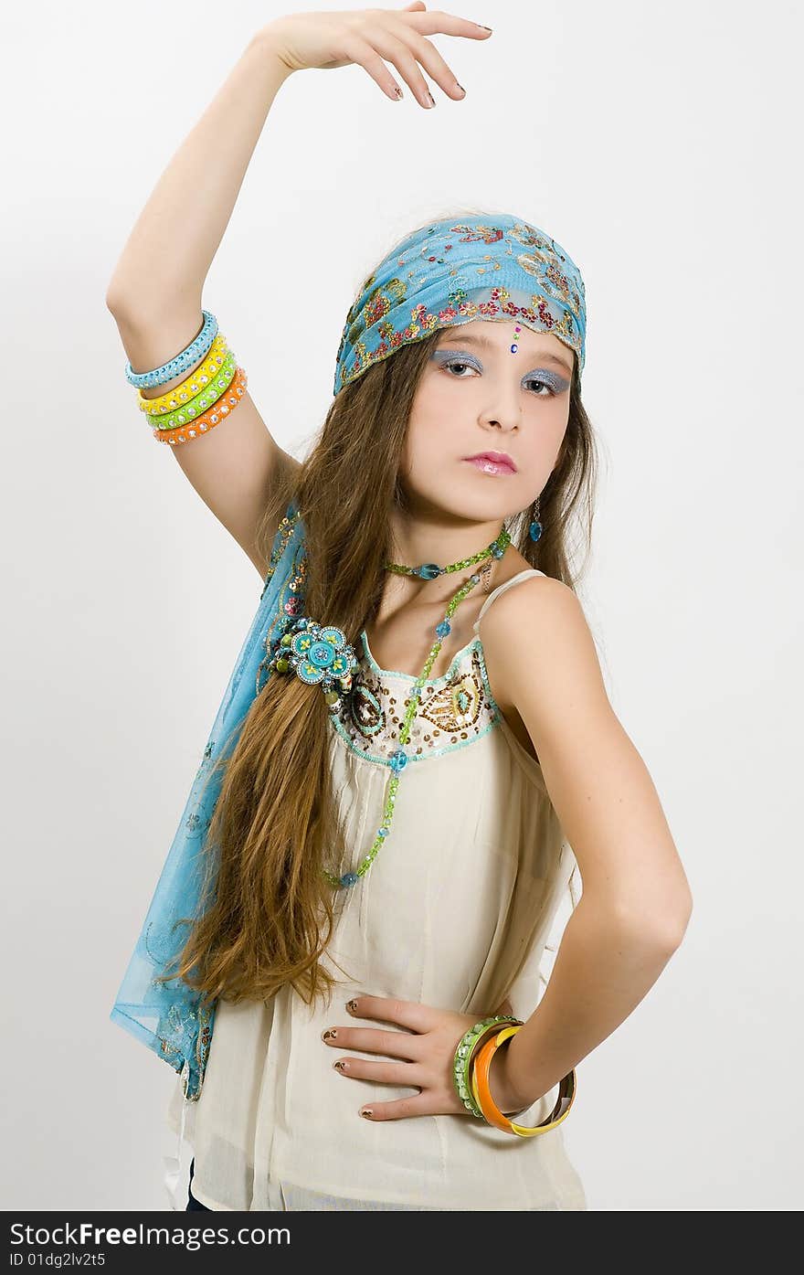 Fashion girl showing jewellery bracelets, scarf and necklace. Fashion girl showing jewellery bracelets, scarf and necklace