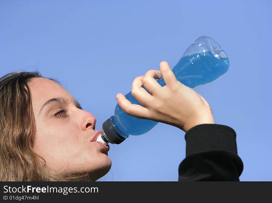 Girl drinking an energetic drink