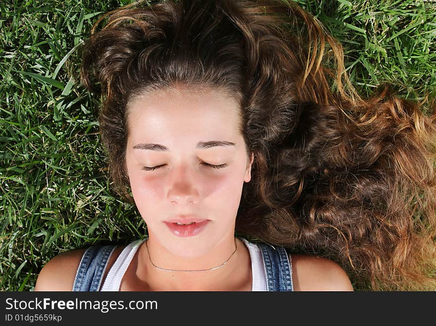 Sweet woman rest on the grass. Sweet woman rest on the grass