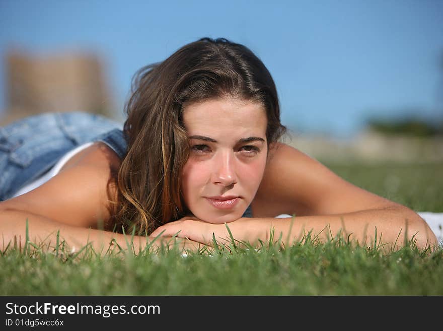 Sweet woman rest on the grass. Sweet woman rest on the grass