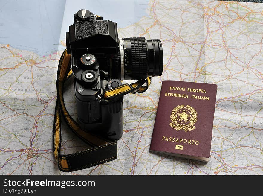 Map, passport and camera, preparing for a trip