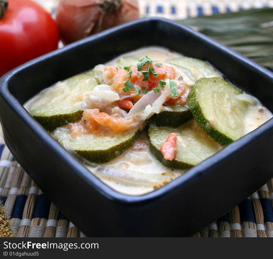 A stew of fresh zucchini with tomatoes