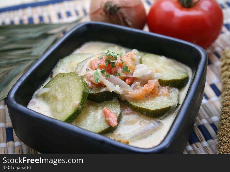 A stew of fresh zucchini with tomatoes