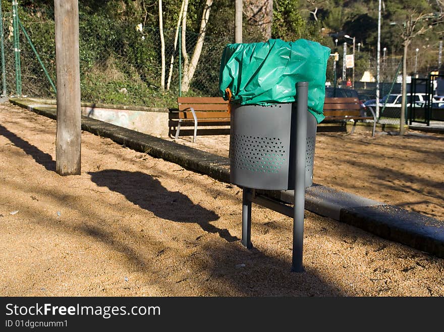 Dastbin with plastic bag in public area