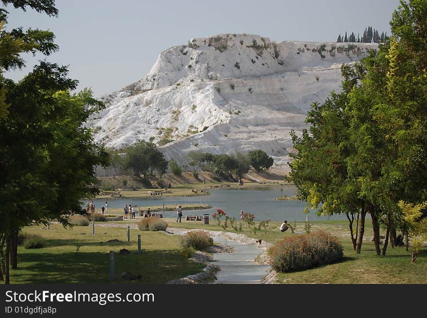 The white hill in the centre is so not because of snow, but rather a deposit of calcium and so looks this way all year round. The white hill in the centre is so not because of snow, but rather a deposit of calcium and so looks this way all year round