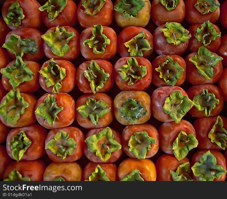 Red tomatoes in a box at the market