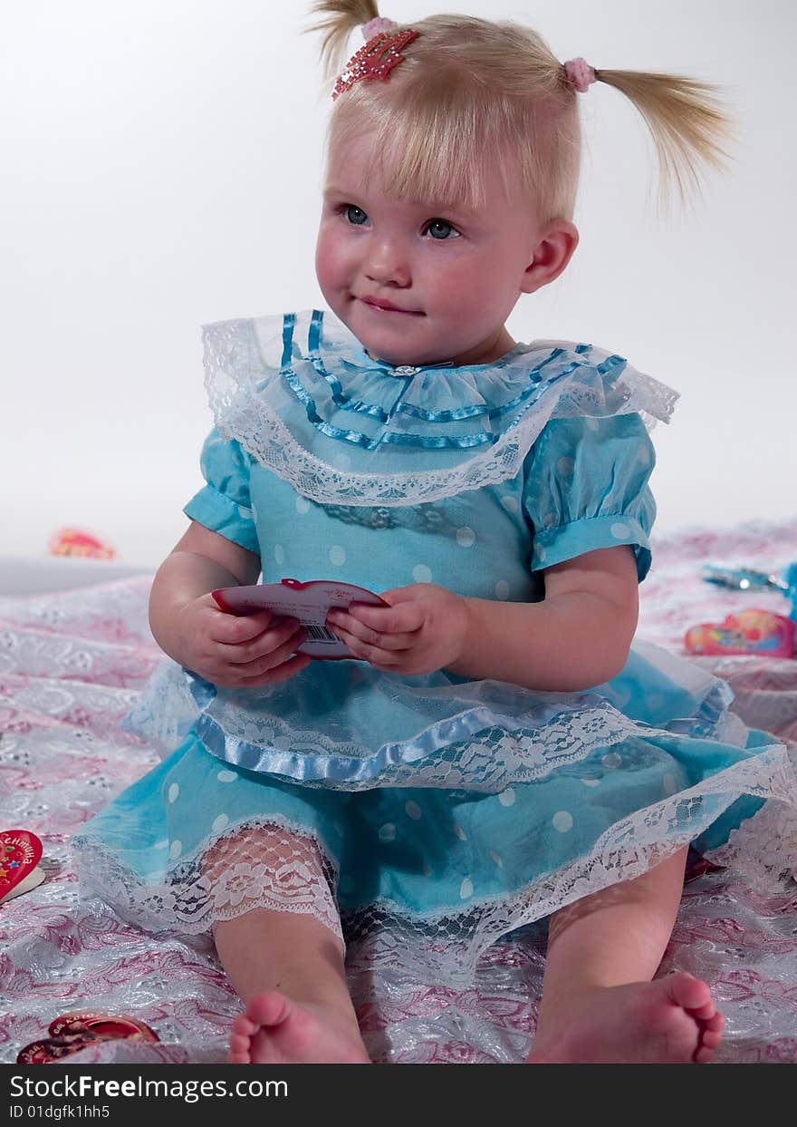 Child In Blue Gown