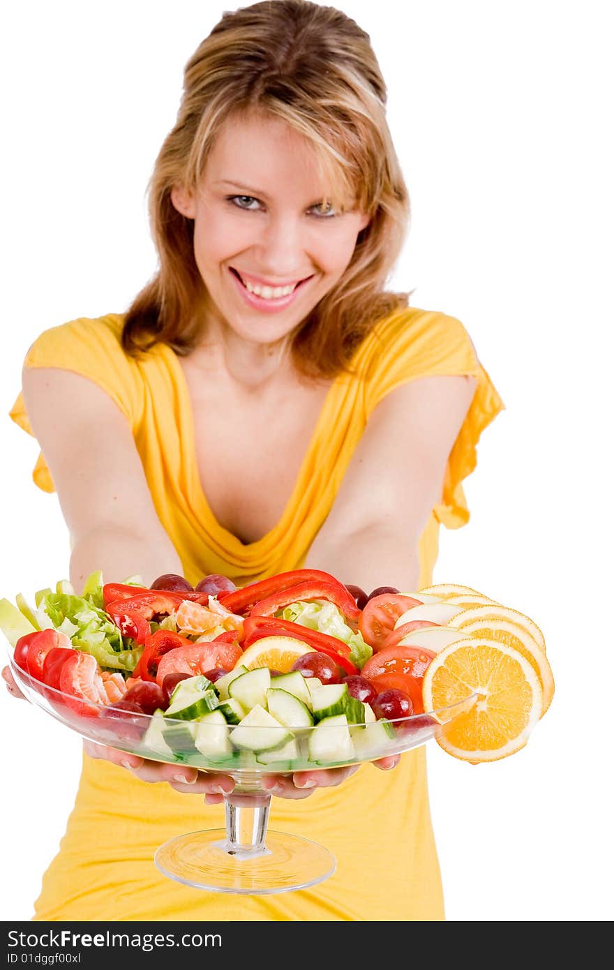 Young girl is presenting a delicous salad. Young girl is presenting a delicous salad