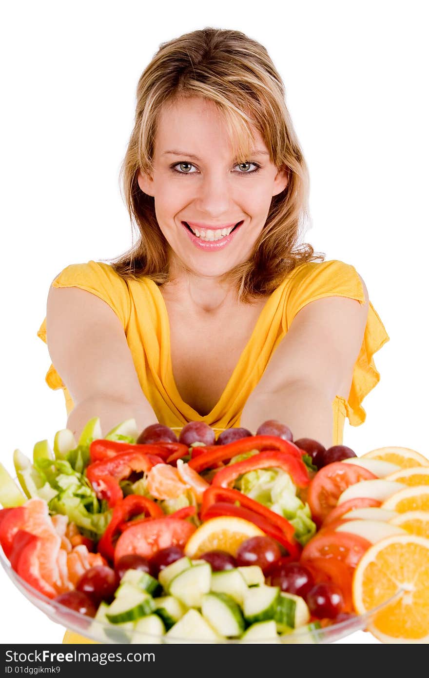 Young girl is presenting a delicous salad. Young girl is presenting a delicous salad