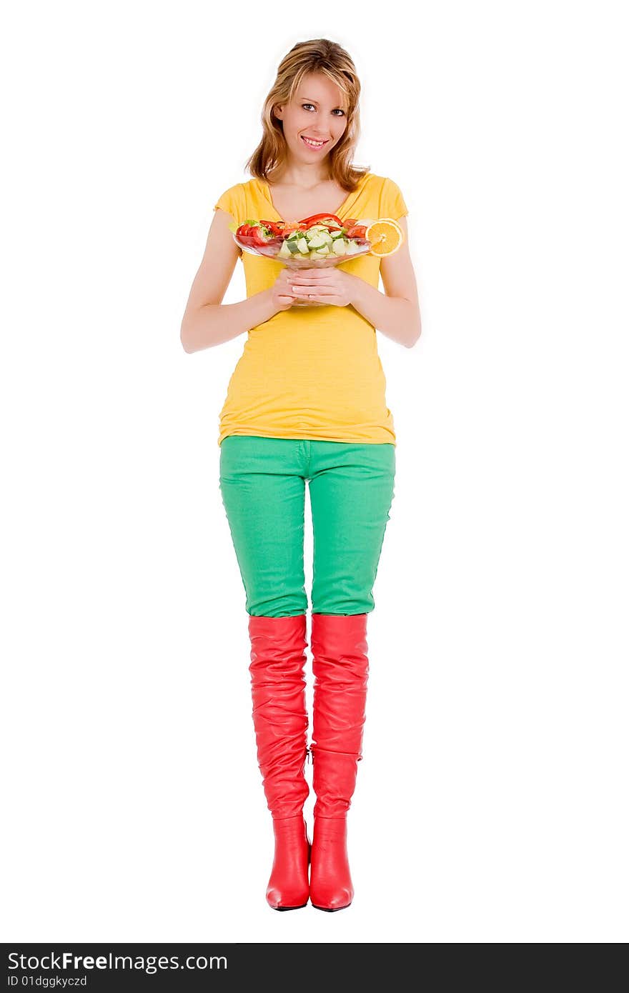 Young girl is posing with a delicious salad. Young girl is posing with a delicious salad