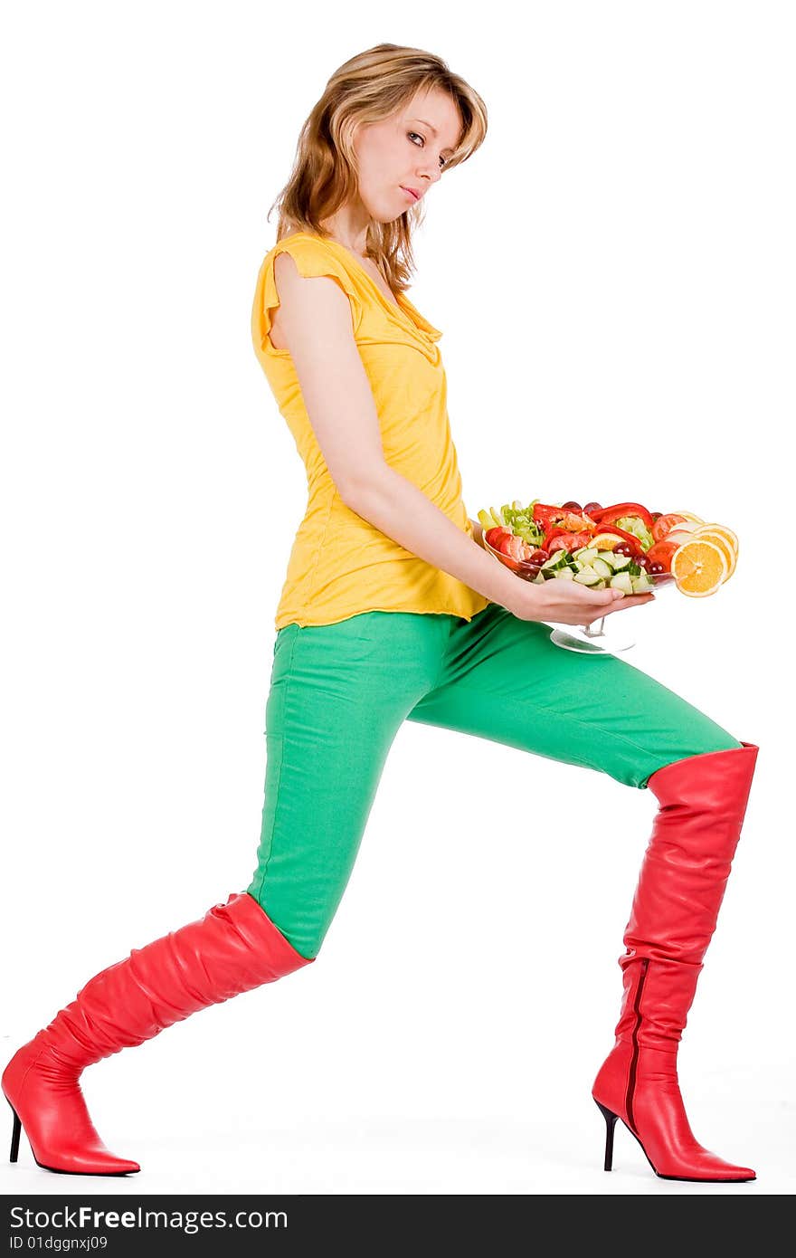 Young girl is posing with a delicious salad. Young girl is posing with a delicious salad