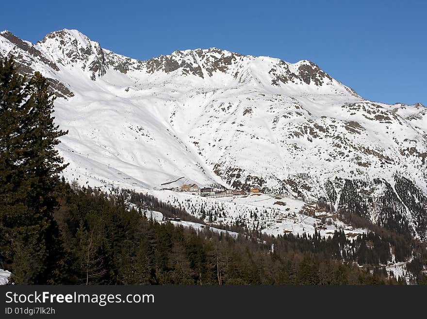 Bright sunny day. Winter mountains.