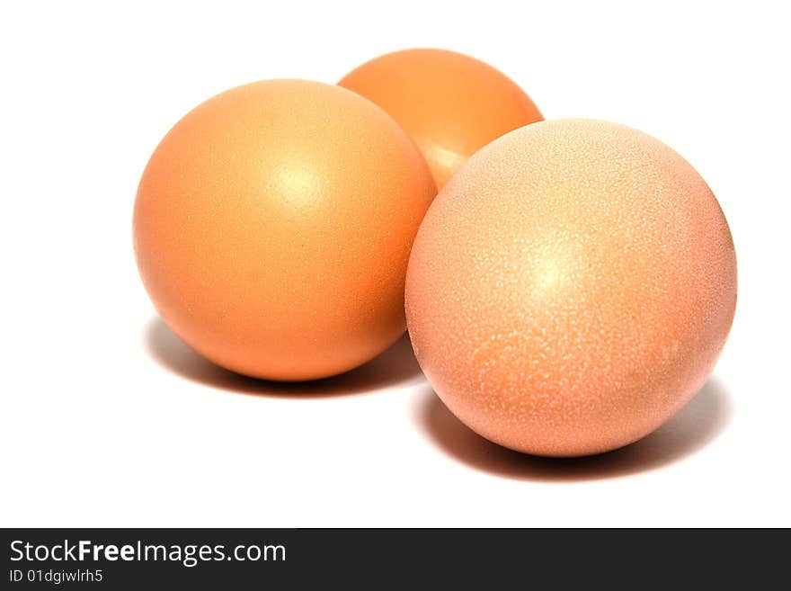 Three eggs isolated on white.