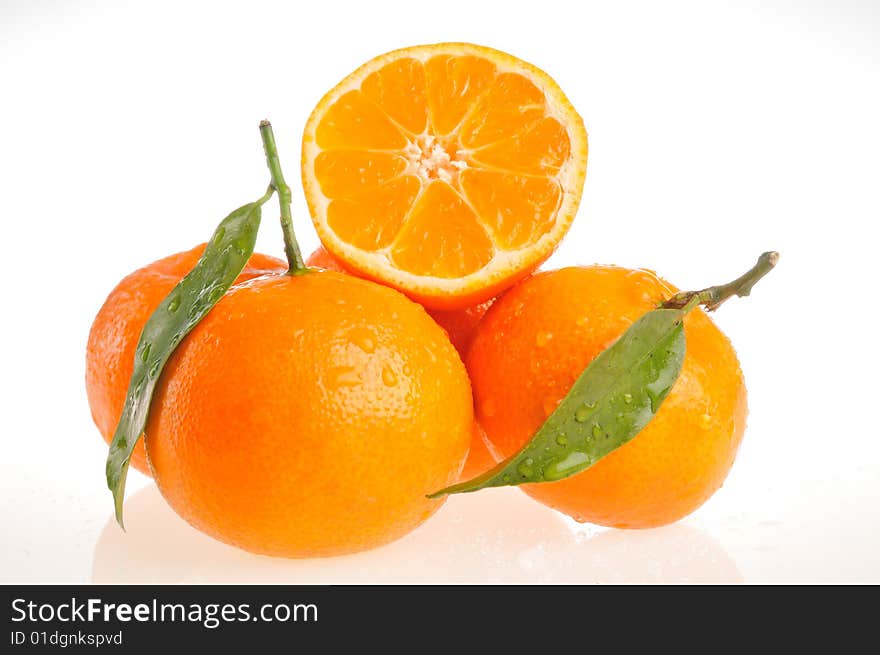 Fresh juicy oranges on white background