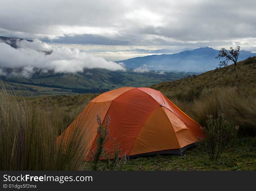 Orange tent in a wide wild landscape. Orange tent in a wide wild landscape