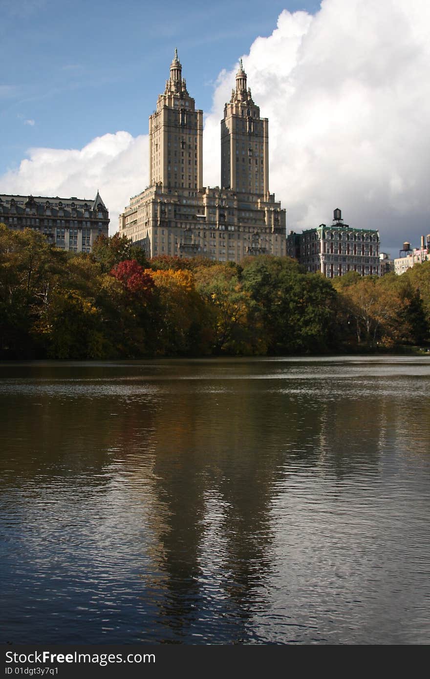 Reflection of apartment buildings on Central Park West looking from the lake in central park.