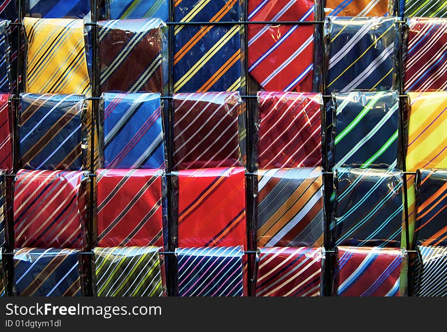 Rows of colored neckties are displayed in the market of San Lorenzo,Florence