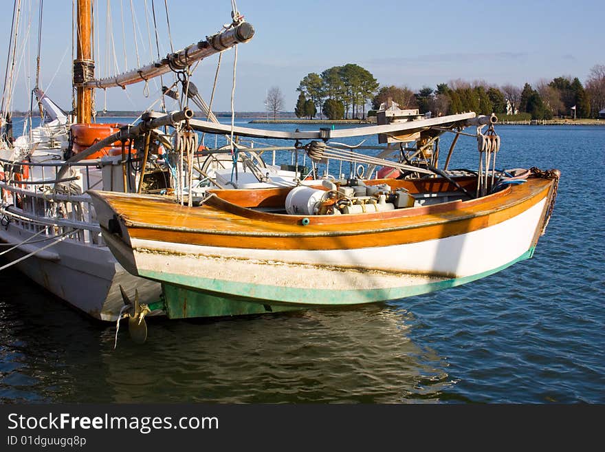 Sailboat With Classic Wooden Dingy.