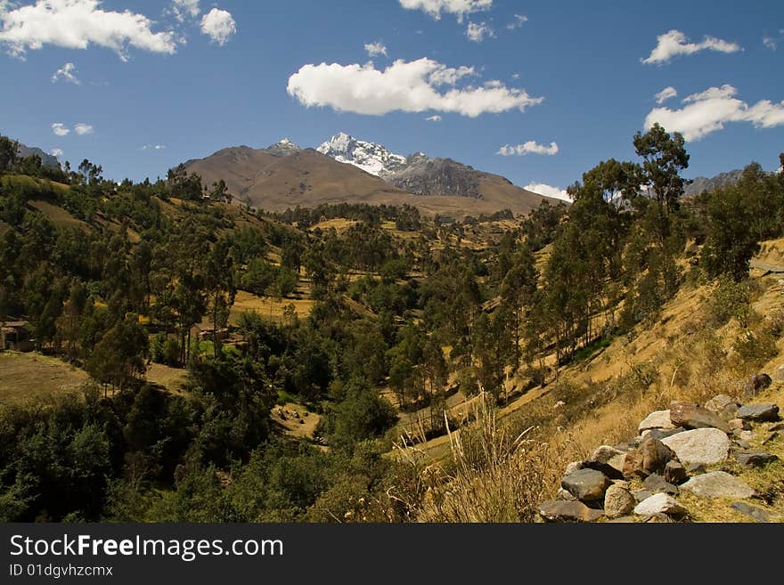 View of the cordillera blanca in Peru with a typical andean patchwork. View of the cordillera blanca in Peru with a typical andean patchwork