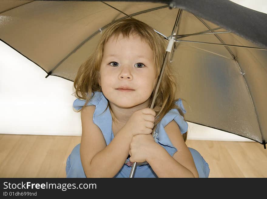 Small Pretty Girl With Umbrella