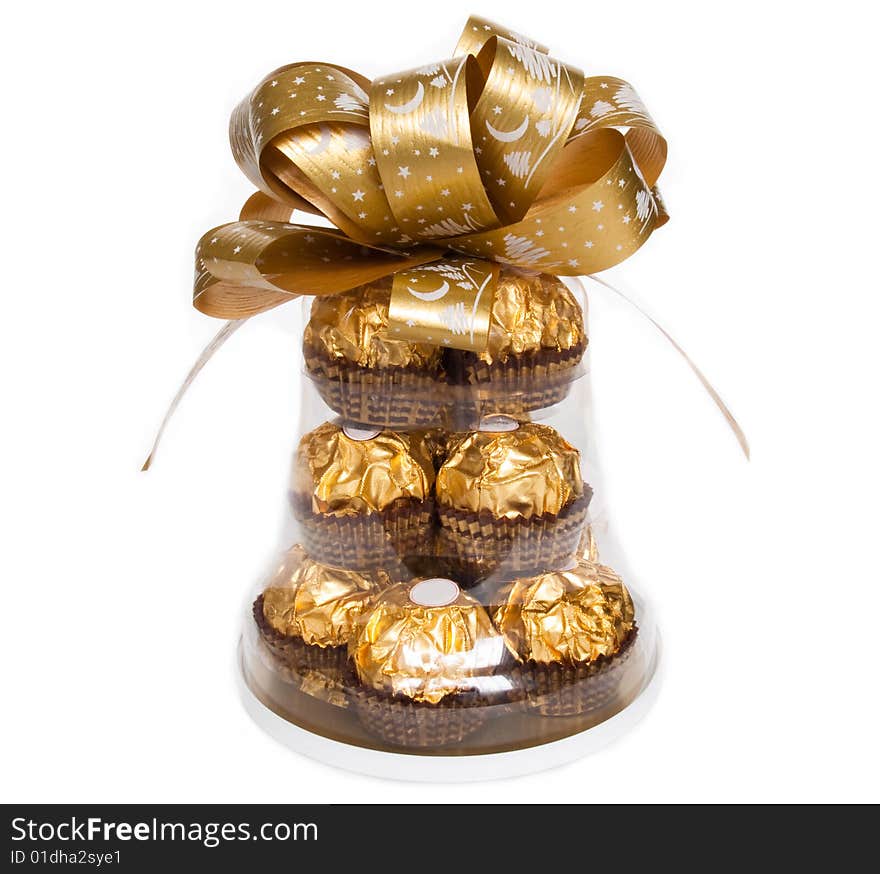 Wrapped candies in boxes on white background