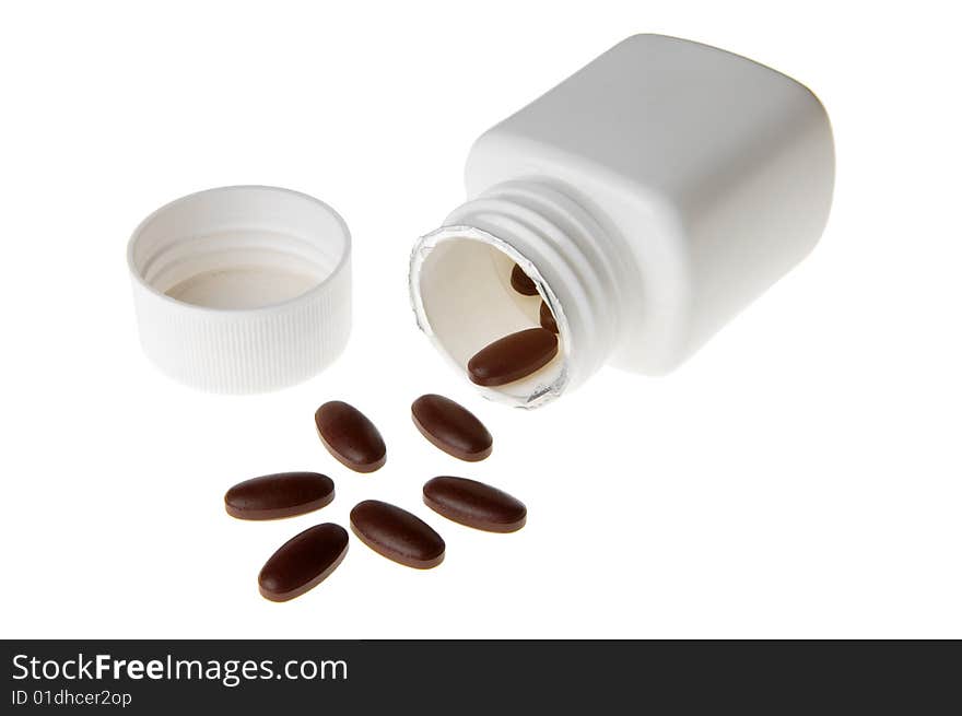 Medicine pills with a white bottle