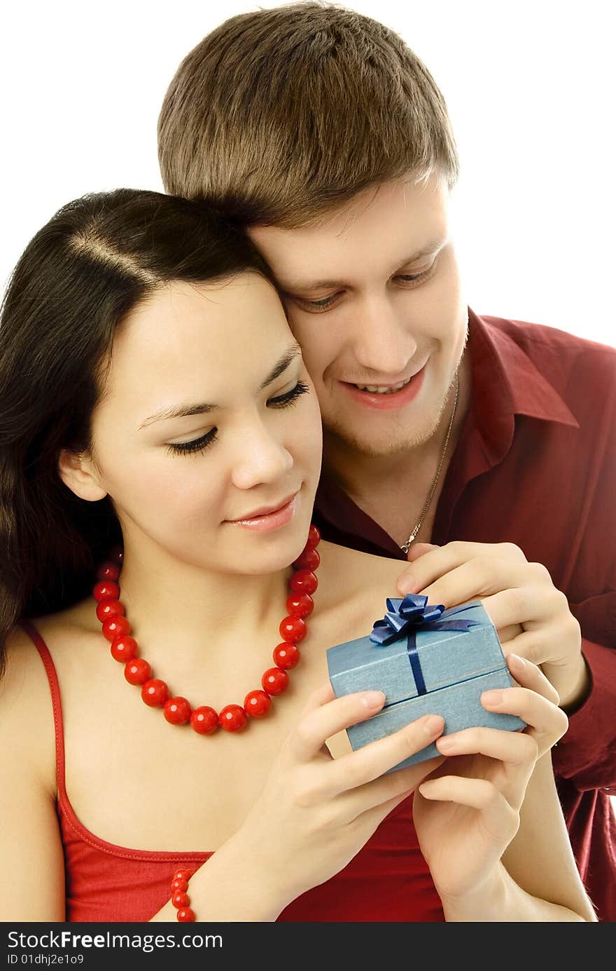 Young man gives a present to his girl