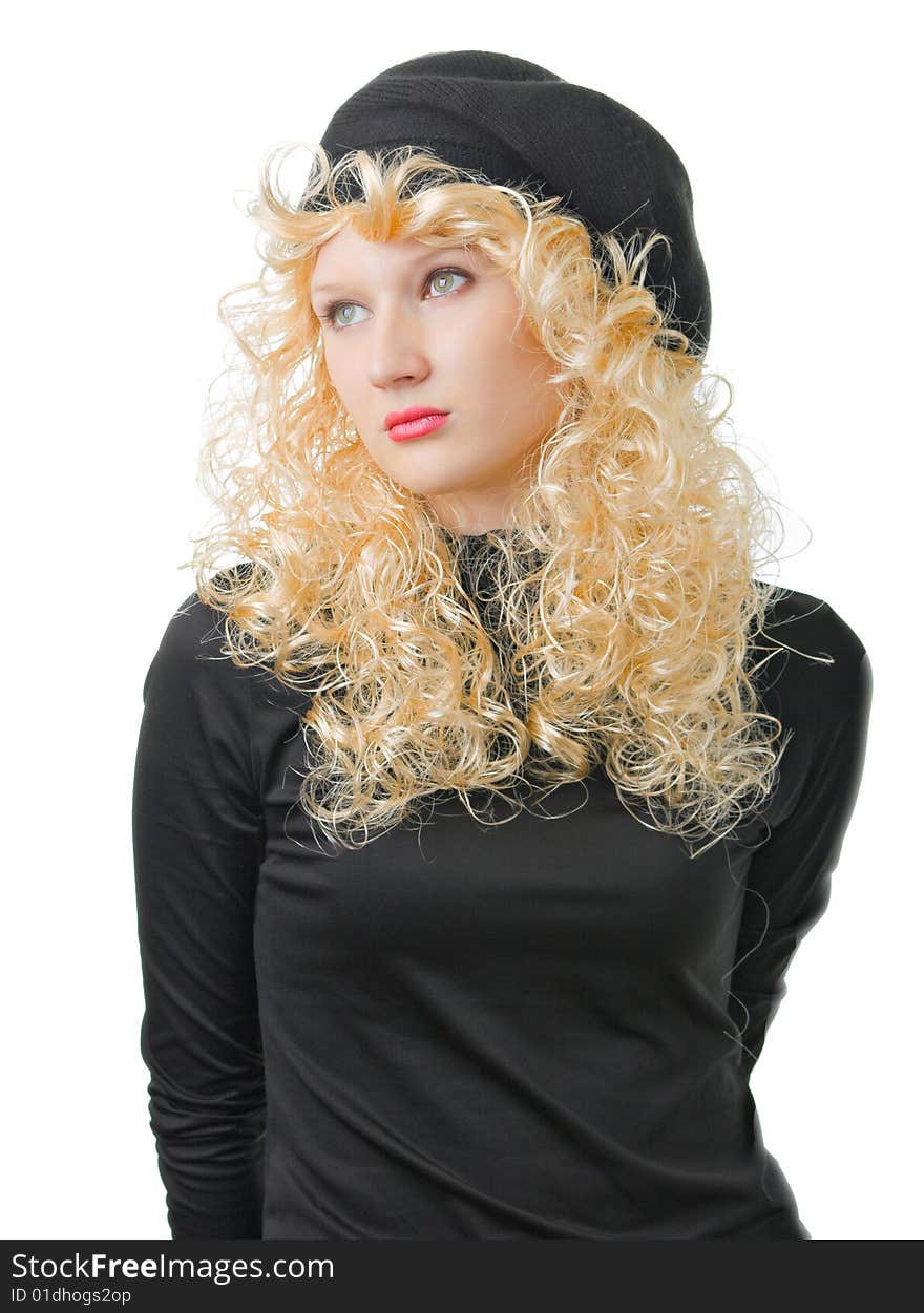 A blonde is in a black cap