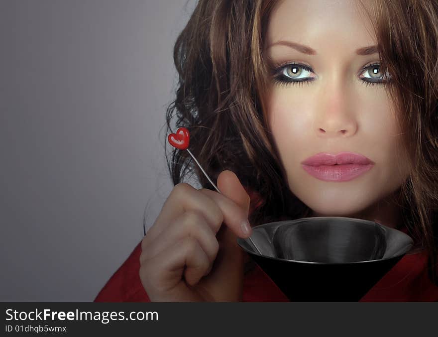 Beautiful Image of a woman with martini in Hand