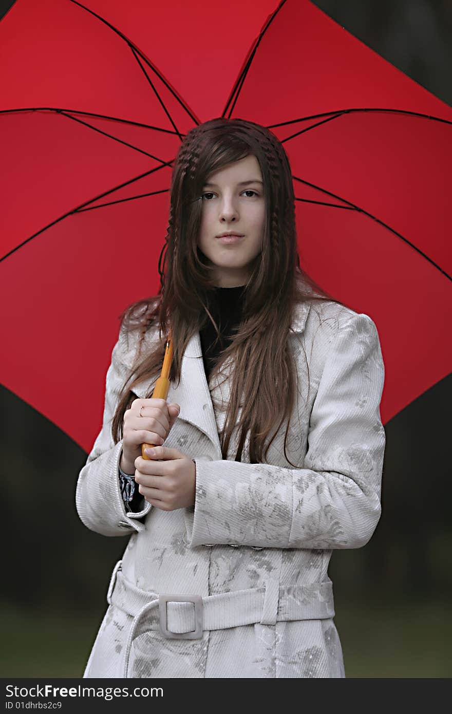 Young girl with red umbrella. Young girl with red umbrella