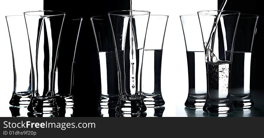 Still life with glasses on the black and white background