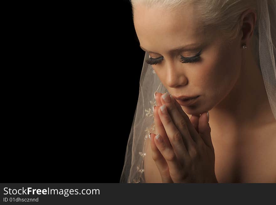 Beautiful Image of a New Bride praying on Black. Beautiful Image of a New Bride praying on Black