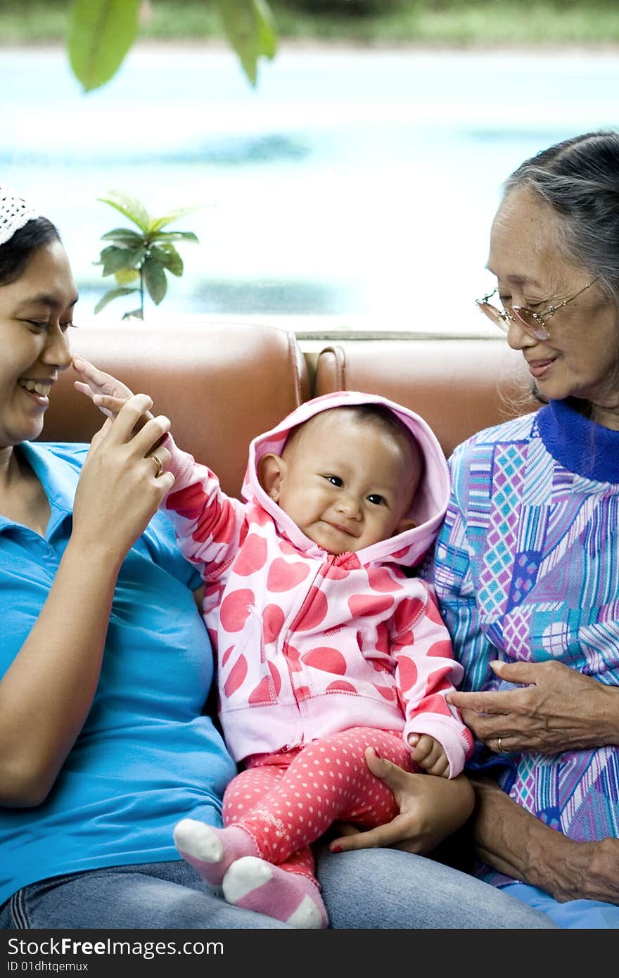 Portrait of happy Asian family