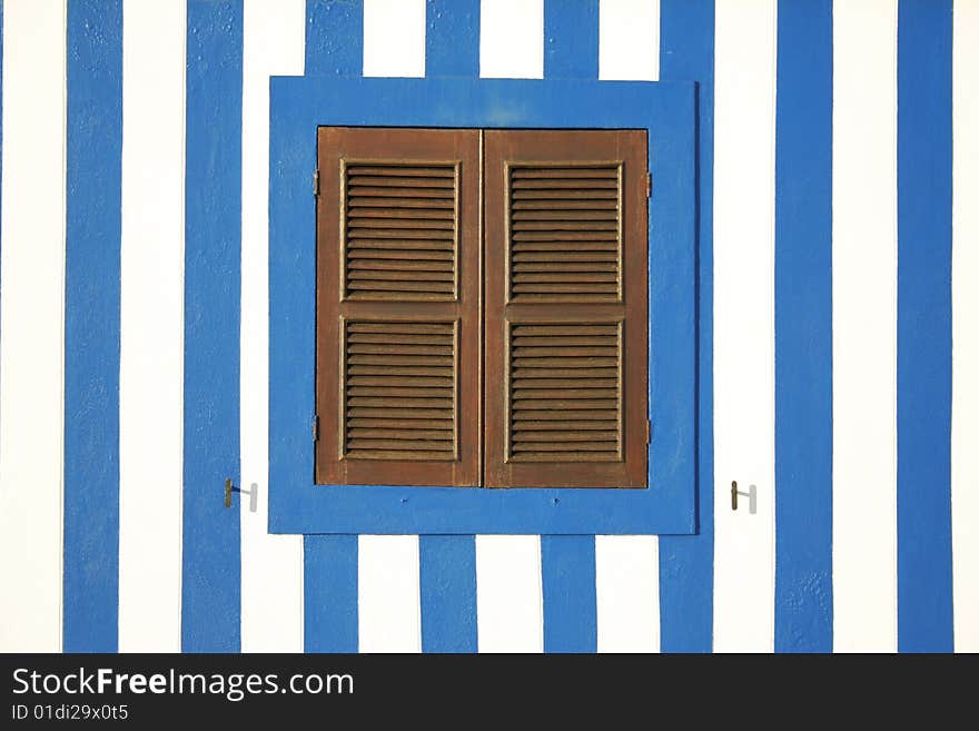 Window with white and blue background wall