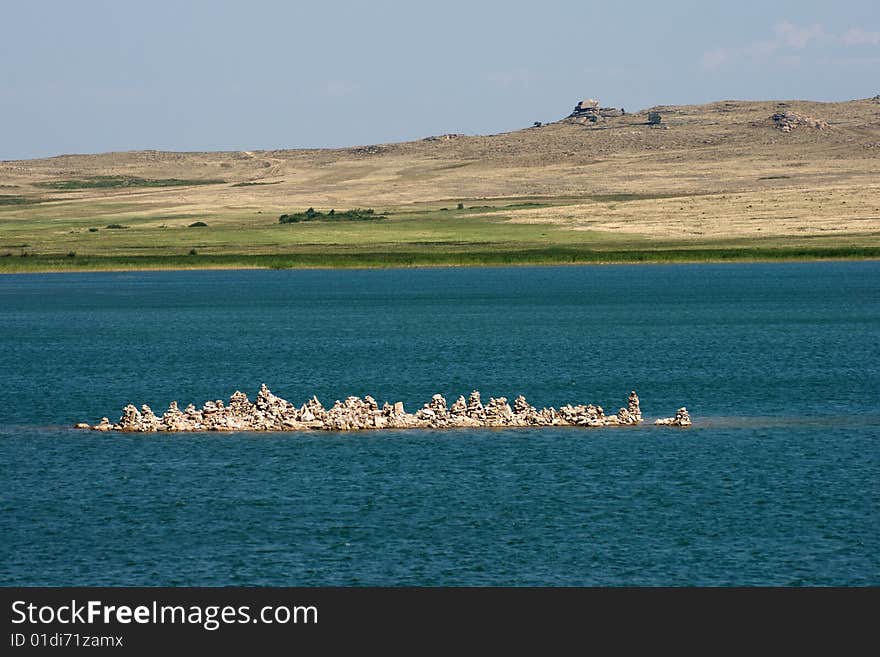 Lake and and stones landscape. Lake and and stones landscape