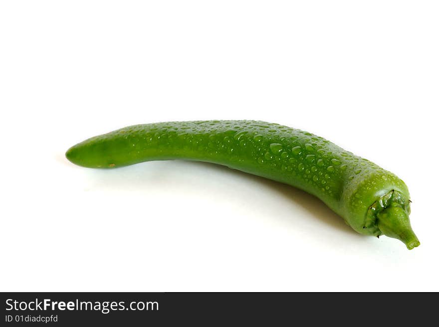 Green hot chili pepper isolated on white