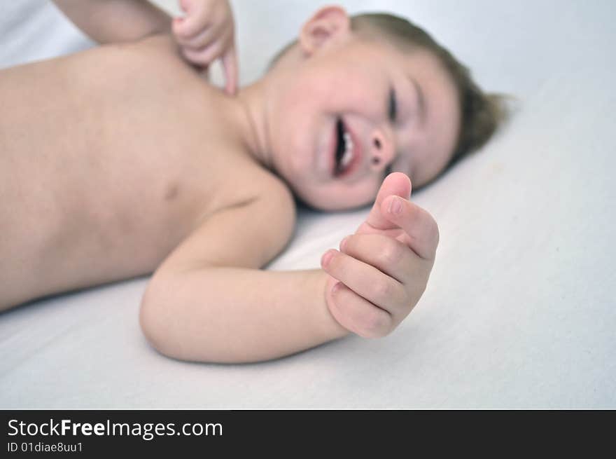 Cute Baby Having Fun Laughing and playing with hands moving around. Cute Baby Having Fun Laughing and playing with hands moving around.