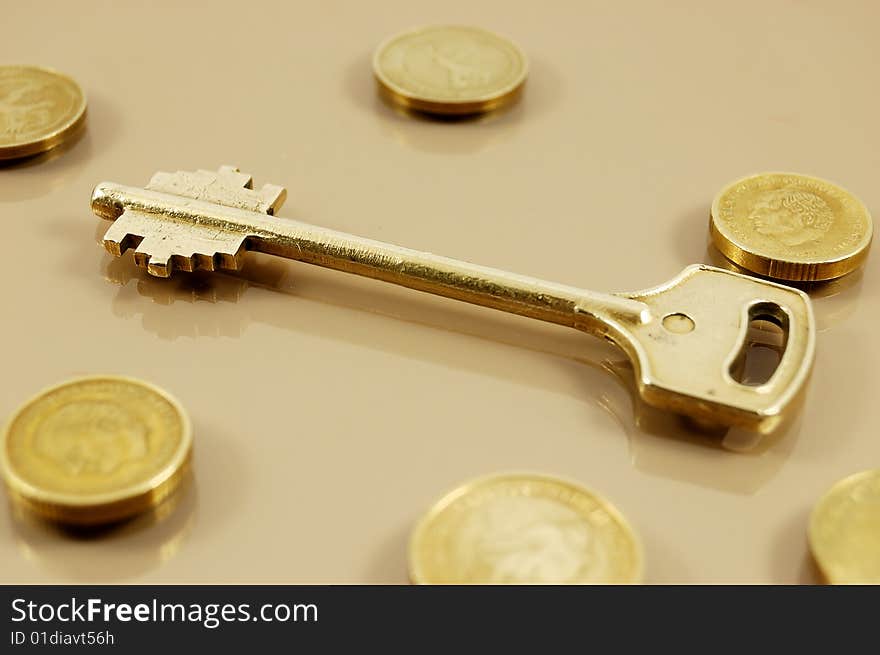 Golden key and coins