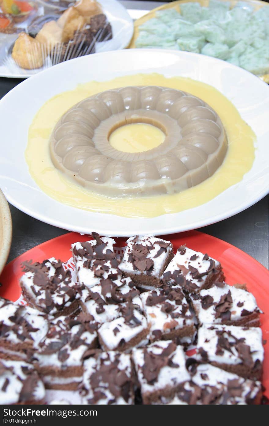 Black forest and Pudding on the plate for buffet. Black forest and Pudding on the plate for buffet