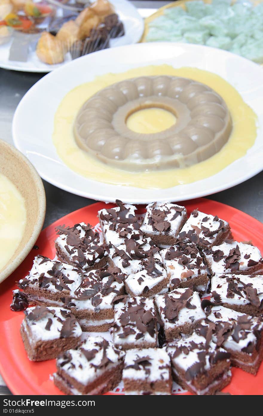 Black forest and Pudding on the plate for buffet. Black forest and Pudding on the plate for buffet