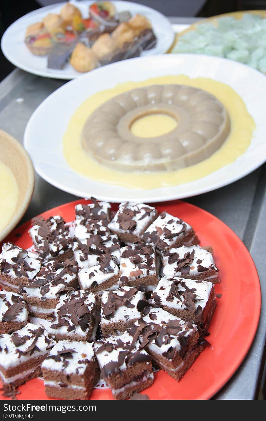 Black forest and Pudding on the plate for buffet. Black forest and Pudding on the plate for buffet