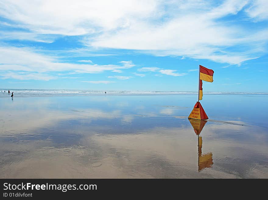 Lifeguard flag at Murawhai beach