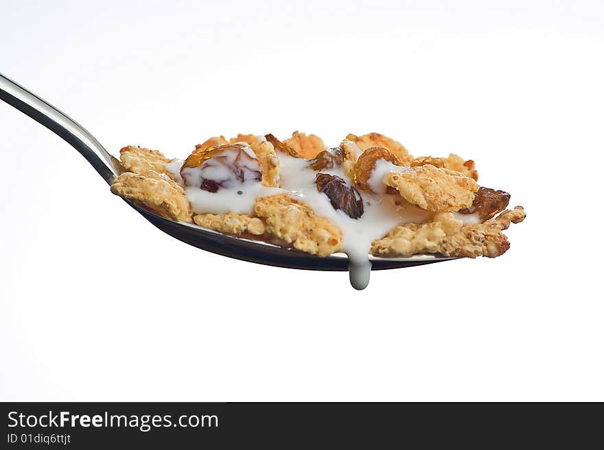 Bowl of cereal with raisins and milk