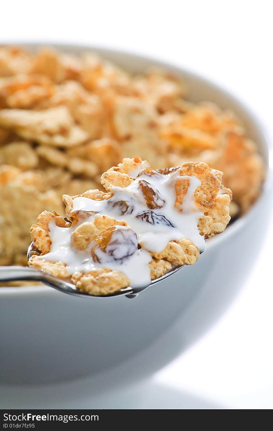 Bowl Of Cereal With Raisins And Milk