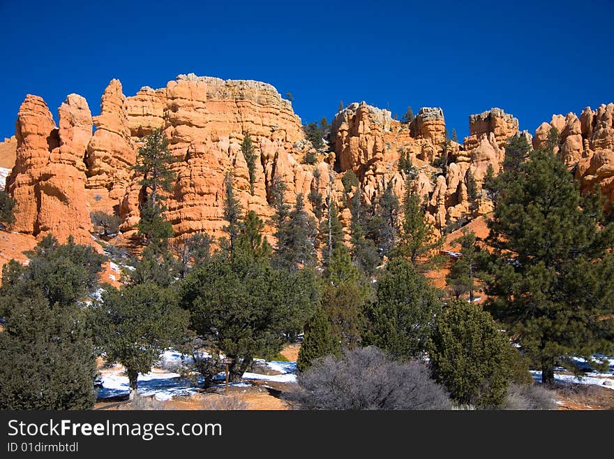 Red Canyon is located along Scenic Byway 12, just 9 miles from Bryce Canyon. Red Canyon is located along Scenic Byway 12, just 9 miles from Bryce Canyon.