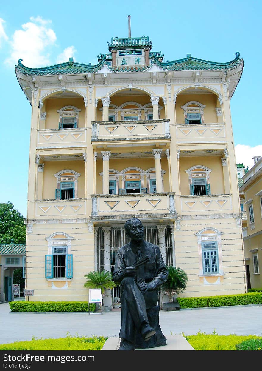 A man Sculpture and his building. A man Sculpture and his building.