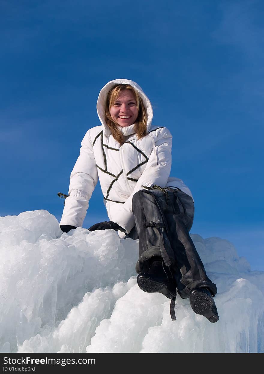 Girl sits on ice