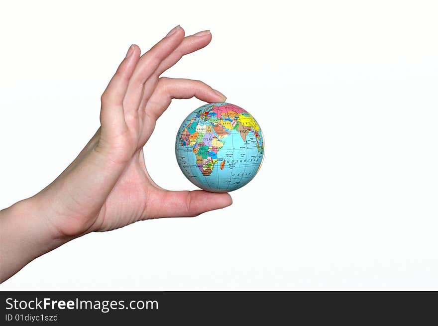 Hand holding a planet on a white background