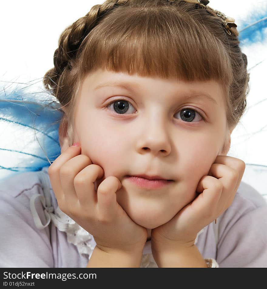 Stock photo: an image of a little girl with blue wings