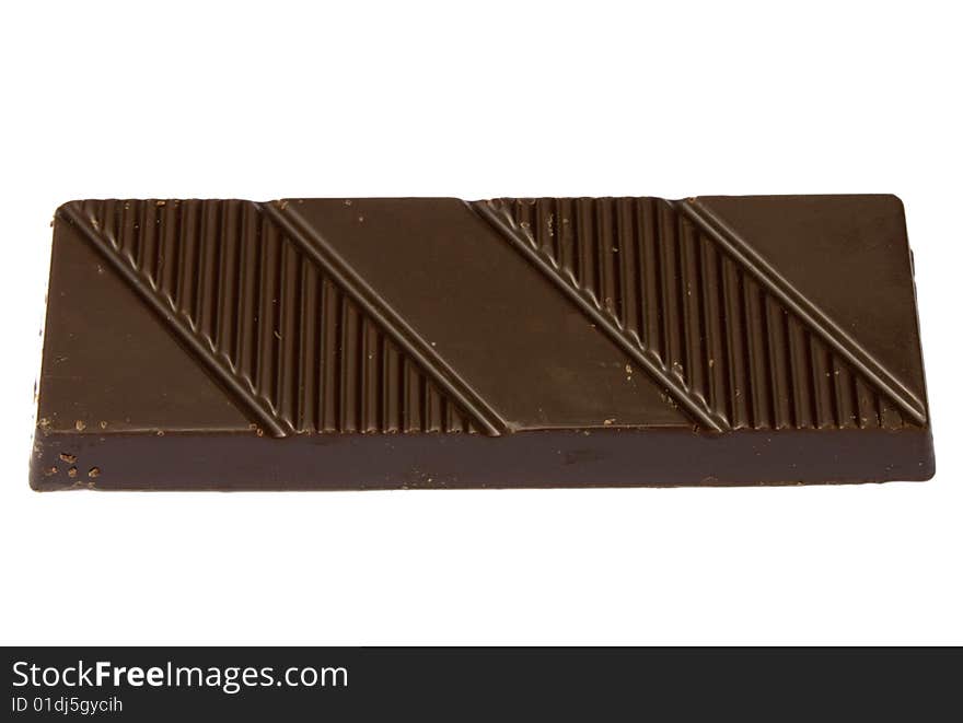 Bar of black chocolate on a white background it is isolated